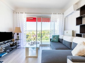 Property, Furniture, Couch, Blue, Shade, Window, Living Room, Interior Design, Comfort, Flooring