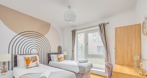 Bedroom 2 has a comfortable zip-link bed which is configured as two single beds by default or can be zipped together to form a king-size bed upon request.