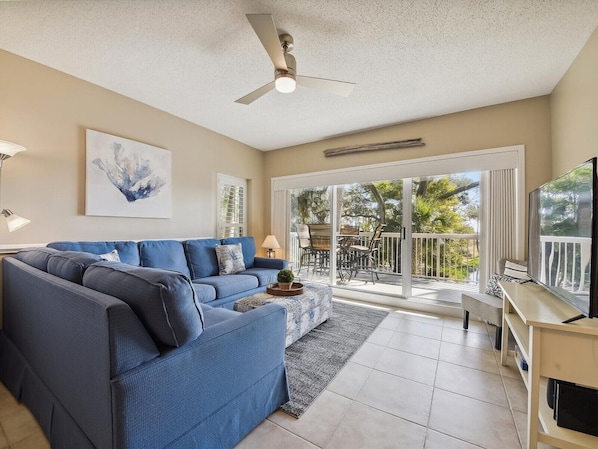 Spacious Living Room at 101 Barrington Arms opens on to the balcony