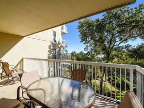 Balcony with Dining Table and Ocean/Pool Views at 308 Barrington Arms