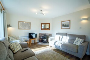 Living room - with smart TV and log burner