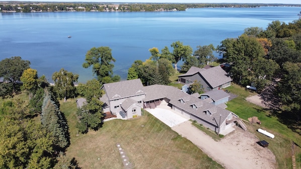 Aerial view of home on beautiful clear Pickerel lake