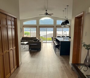 Kitchen, living, dining great room with fantastic lake view.