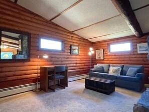 Classic log cabin interior with plenty of natural light