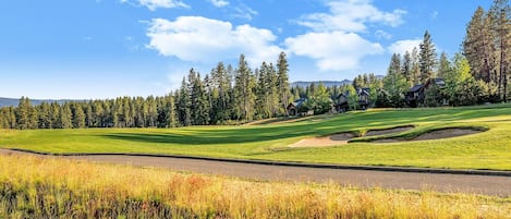 An oasis of relaxation awaits in this high-end mountain home overlooks hole 12 on Rope Rider