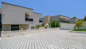 Private parking places of a Croatia luxury sea view villa Asteria for family vacation in Trogir
