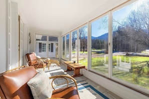 Three season sun porch with views of the polo ponies at Dorset Farm.