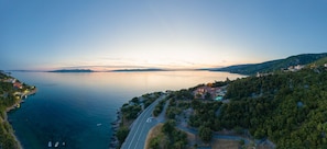 The villa and its surroundings aerial view.