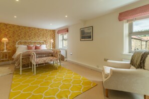 Beadale Cottage, Ampleforth: Master bedroom featuring king-size bed