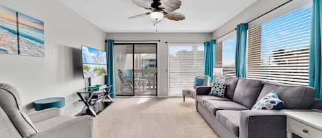 Living room with big windows for a lot of natural lighting 