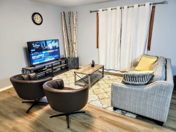 Living room area with rustic decor.