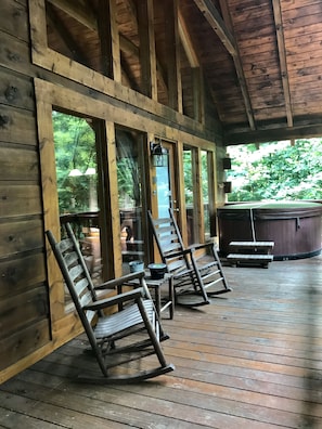 Relax in a rocker on the back private deck or take a dip in the hot tub.