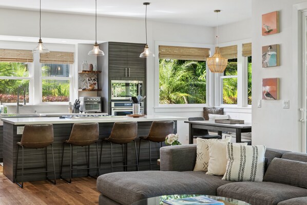 Kitchen island is a great place to prep meals and chat with frie