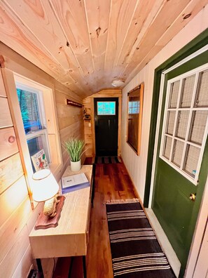 Mudroom facing front door to house - entry to main house on the right
