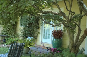 Enter through private French doors or, sit in the garden and enjoy nature. 