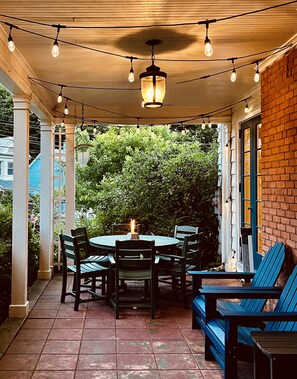 Patio with dining area, Adirondack chairs, and more!
