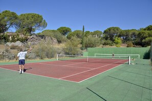 Private tennis court in the lower garden 