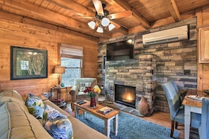 Kick back and relax at this charming vacation rental studio cabin!