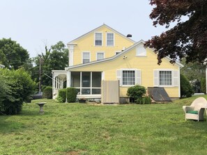 backyard with lots of room to play, and custom granite cobblestone outdoor showe