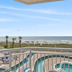 Watch the kids splash and play, while you rock the day away.