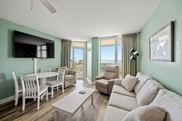 The ocean front living room is well-appointed with comfortable furnishings.