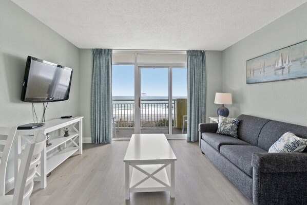 Gather together for a fun family game night in this oceanfront living room.