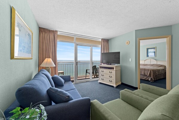 Enjoy family movie night in this oceanfront living room.