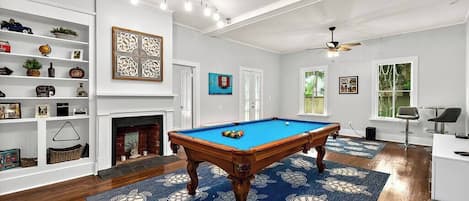 Huge game room with pool table, 75” tv and enough room for everyone