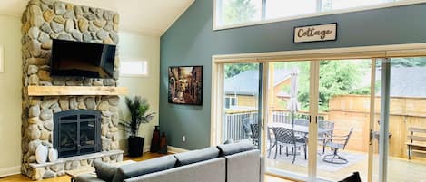 open concept living, dining area