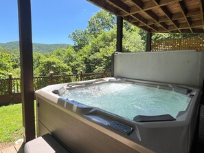 Enjoy the hot tub and the view at the same time. 