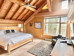 Master bedroom with king bed on the upper level