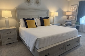 Huge master suite with a great reading chair and ottoman