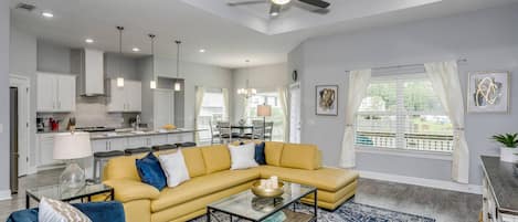 The large living room is open to the kitchen and dining room