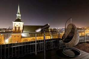 The terrace provides a serene environment for relaxation. 