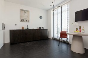 The kitchenette's practical layout maximizes space and functionality.