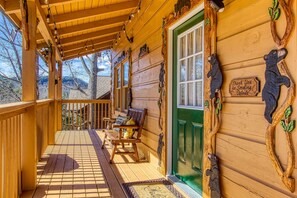 Relax and view surrounding mountain slopes rising in the near distance out front