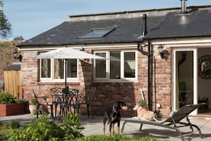 The Brazilian slate patio catches sun all day.