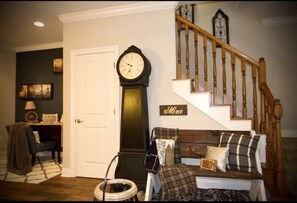 Entry way with bench seating and office space perfect for working from home!