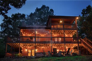 Capture the warm ambiance of Bear-Foot Hideaway with the lights strung on each deck, the hot tub heating up and the fire roaring!