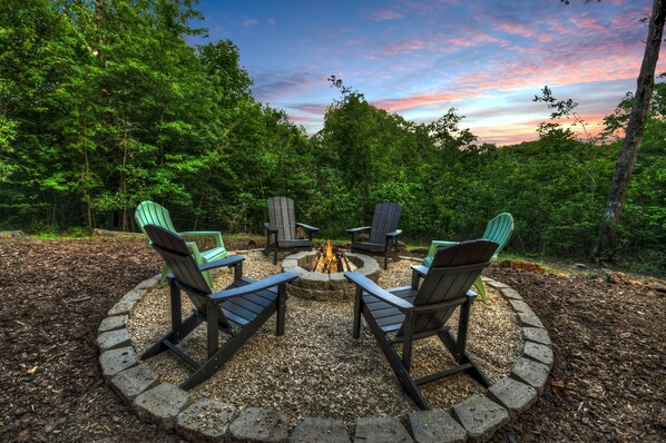 Gather around the campfire under a stunning sunset, perfect for laughs and s'mores!