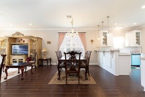 Stunning dining room with antique chandelier.