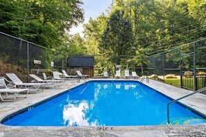 The perfect setting for a pool, surrounded by towering trees!