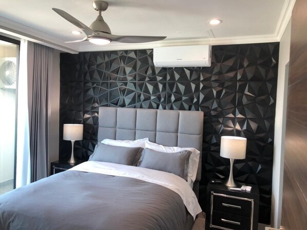 Main bedroom with a modern touch.
