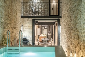 Sophisticated pool surroundings offering a sense of tranquility & privacy!