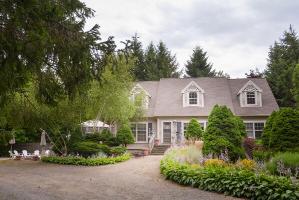 Front of Devilstone's Guest House. Deck and outdoor seating to the left.