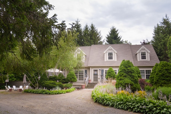 Front of Devilstone's Guest House. Deck and outdoor seating to the left.