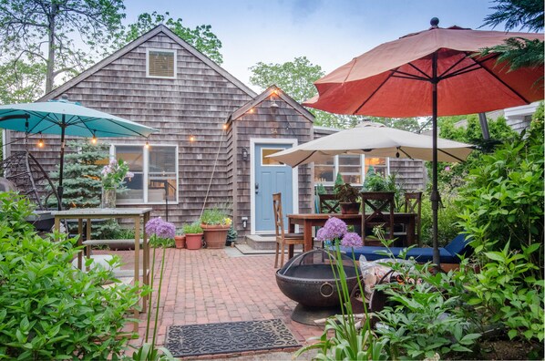 Private front courtyard with designer gardens