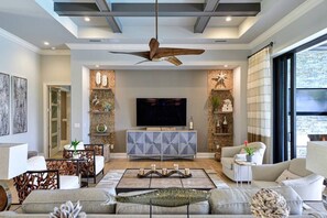 The spacious main living area offers ample seating and breathtaking views