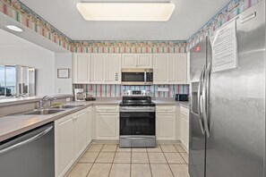 The family chef will love this modern kitchen with stainless steel appliances.