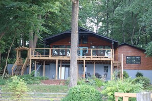 Lake side of house with covered porch